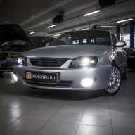 Kia Spectra - улучшение света фар. Установка билед линз Aozoom